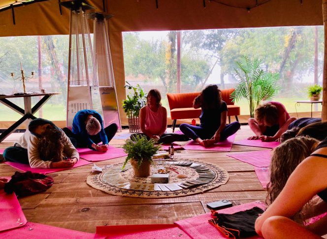 Camino Yoga Escape Participants practicing morning yoga outdoors during the Camino Yoga Escape