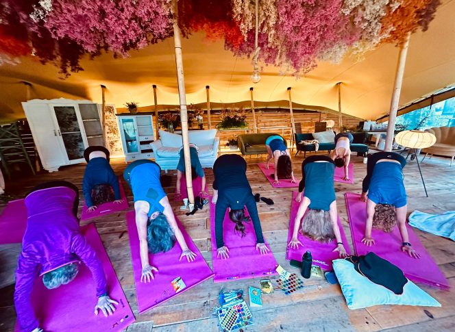 Camino Yoga Escape Participants practicing morning yoga outdoors during the Camino Yoga Escape